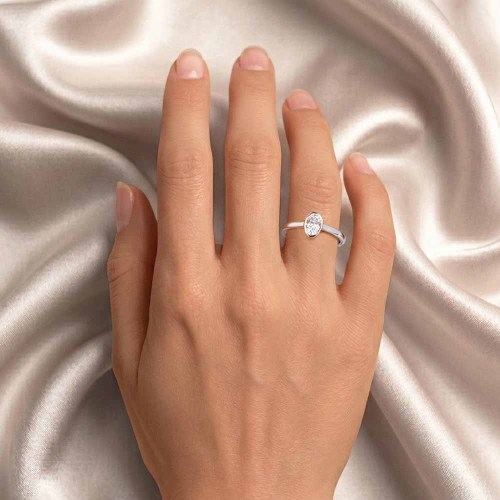 Bezel eljegyzési gyűrű - ovális 0,5ct - fehérarany